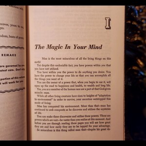 May include: A vintage book with a yellowed page open to a chapter titled "The Magic In Your Mind". The text discusses the power of the human mind and how it can be used to achieve happiness, health, and wealth.