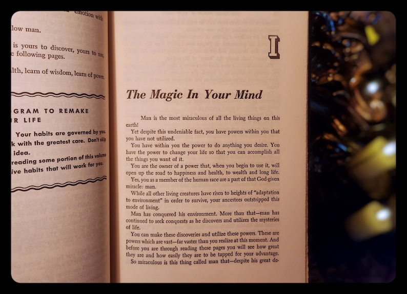 May include: A vintage book with a yellowed page open to a chapter titled "The Magic In Your Mind". The text discusses the power of the human mind and how it can be used to achieve happiness, health, and wealth.