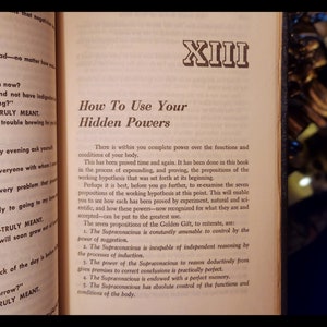 May include: A page from a book titled "How To Use Your Hidden Powers." The text discusses the seven propositions of the Supraconscious, which are said to be the "Golden Gift." The text is in black and white and is set against a cream-coloured background.