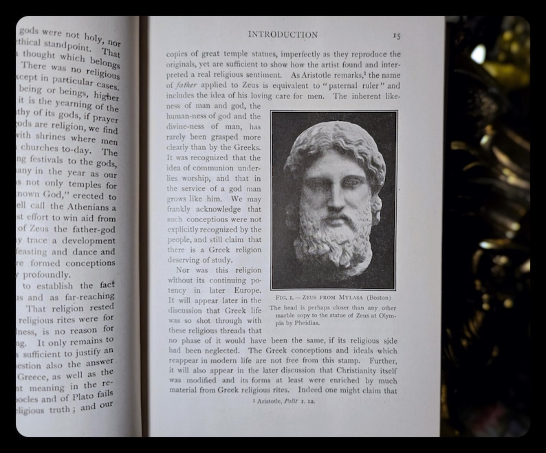 May include: A black and white image of a bust of Zeus from Mylaea. The text below the image reads "Fig. 6. - Zeus from Mylaea (British Museum). The head is perhaps closer than any other marble copy to the statue of Zeus at Olympia by Pheidias."
