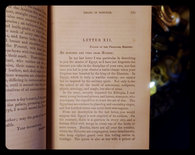 May include: A page from a book titled "Israel in Bondage" with the text "Letter XII. Palace of the Pharaoh, Memphis." and a passage about the armies of Egypt and their military spirit.