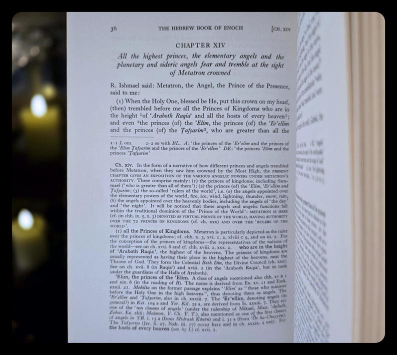 May include: An open book displaying text from The Hebrew Book of Enoch, Chapter XIV. The text describes angels and heavenly beings. The pages are yellowed, and the text is in black. The book is open to a chapter with detailed text.