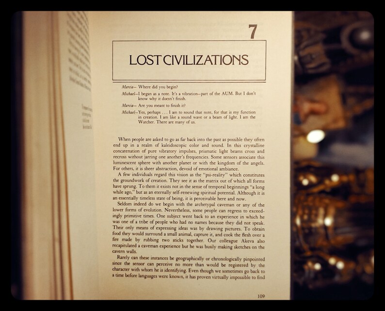 May include: A page from a book titled "Lost Civilizations" with text about the concept of "psi-reality" and the origins of creation. The text discusses how people often end up in a realm of kaleidoscopic color and sound when trying to go back as far as possible in time.