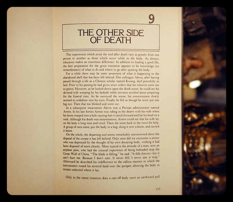 May include: A page from a book titled "The Other Side of Death" with a black and white image of a person in the background. The text discusses the experiences of the soul after death and how education and preparation can help with the transition.