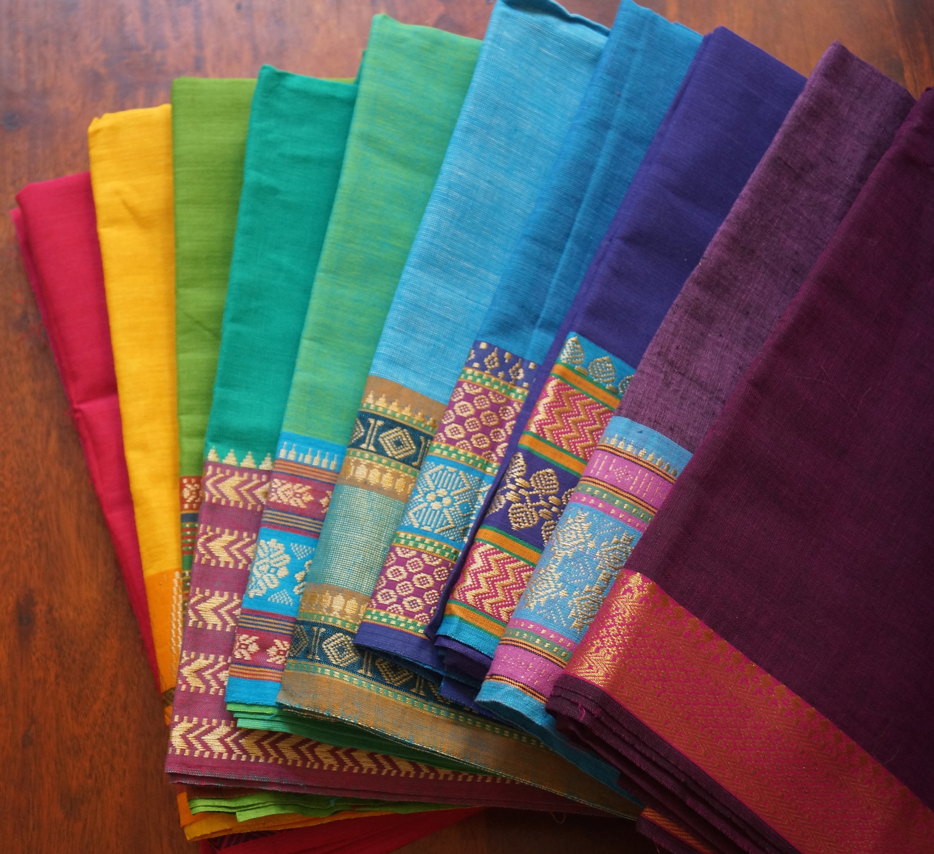 Cotton cushion cover from South India bordered with a jacquard braid sari style available in several colors Arc en Ciel series