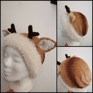 May include: A brown and white knitted deer hat with a faux fur trim. The hat has a brown knit body with a white knit deer face and antlers.