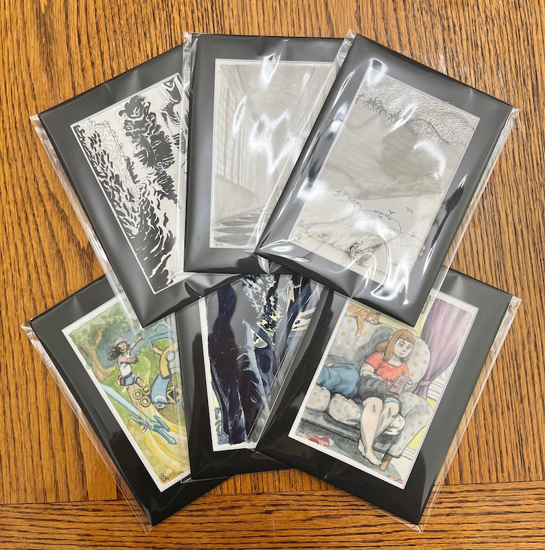 May include: A collection of framed art prints, each in a black mat and sealed in clear plastic. The artwork includes various illustrations in black and white and color, depicting scenes of nature, figures, and interior settings.
