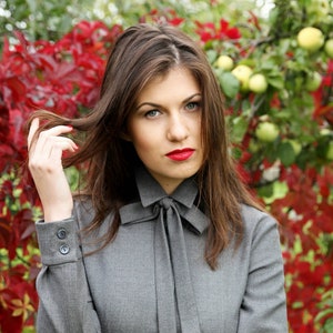 Elegant wool button up shirt dress. Dress has additional bow tie for more romantic look.