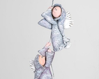 Ängelväggfigur, ängelväggskulptur, väggbonad i keramik