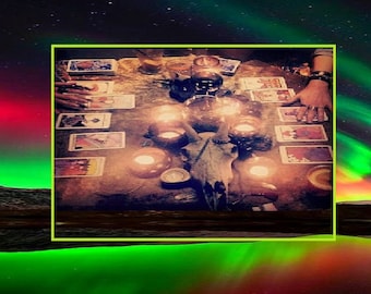 May include: A tarot card reading spread with lit candles and a skull on a wooden table. The scene is lit by the green and red glow of the aurora borealis in the background.