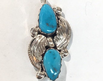 Native American Navajo handmade sterling silver and Blue Gem turquoise pendant