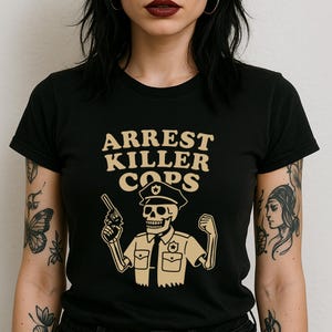 Arrest Bad Cops Shirt - Bold Skeleton Cop Protest Graphic Tee, Anti-Police Brutality Statement for Abolitionists & Street Activists