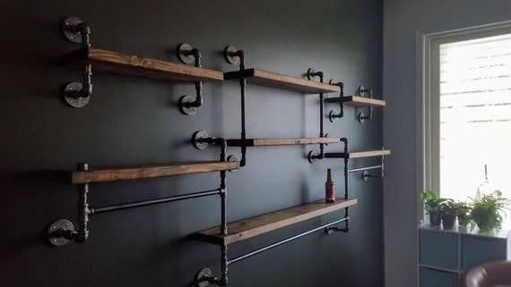 Metal wall best sale shelving unit