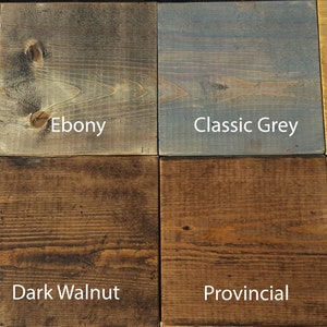 May include: Eight wood stain colour samples, showing different shades of brown, red, grey, and yellow. The stains are labelled: Red Mahogany, Ebony, Classic Grey, Golden Oak, Jacobean, Dark Walnut, Provincial, and Special Walnut.