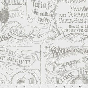 May include: A white fabric with a gray vintage design featuring text and illustrations. The design includes phrases like "Position for Sitting & Holding the Pen" and "The Wilson Theatre Co." The fabric has a ruler along the bottom edge.