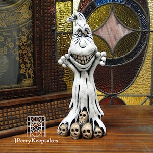 Creepy Hee Hee Ghost Standing on Skulls Figurine Looking Down Halloween Decoration, Hand Painted Ceramic Halloween Decorations Figurines