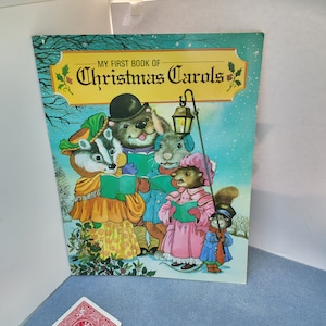 1st Book of Christmas Carols soft cover classic with great imagery - an Ideals Publication