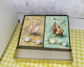 Diseños de concha de doble piso Uno usado, uno nuevo plástico original y sello en caja de cartón Recuerdo de Florida -ver fotos, video y descripción