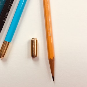 Pencil-Crown (pencil performance enhancer)