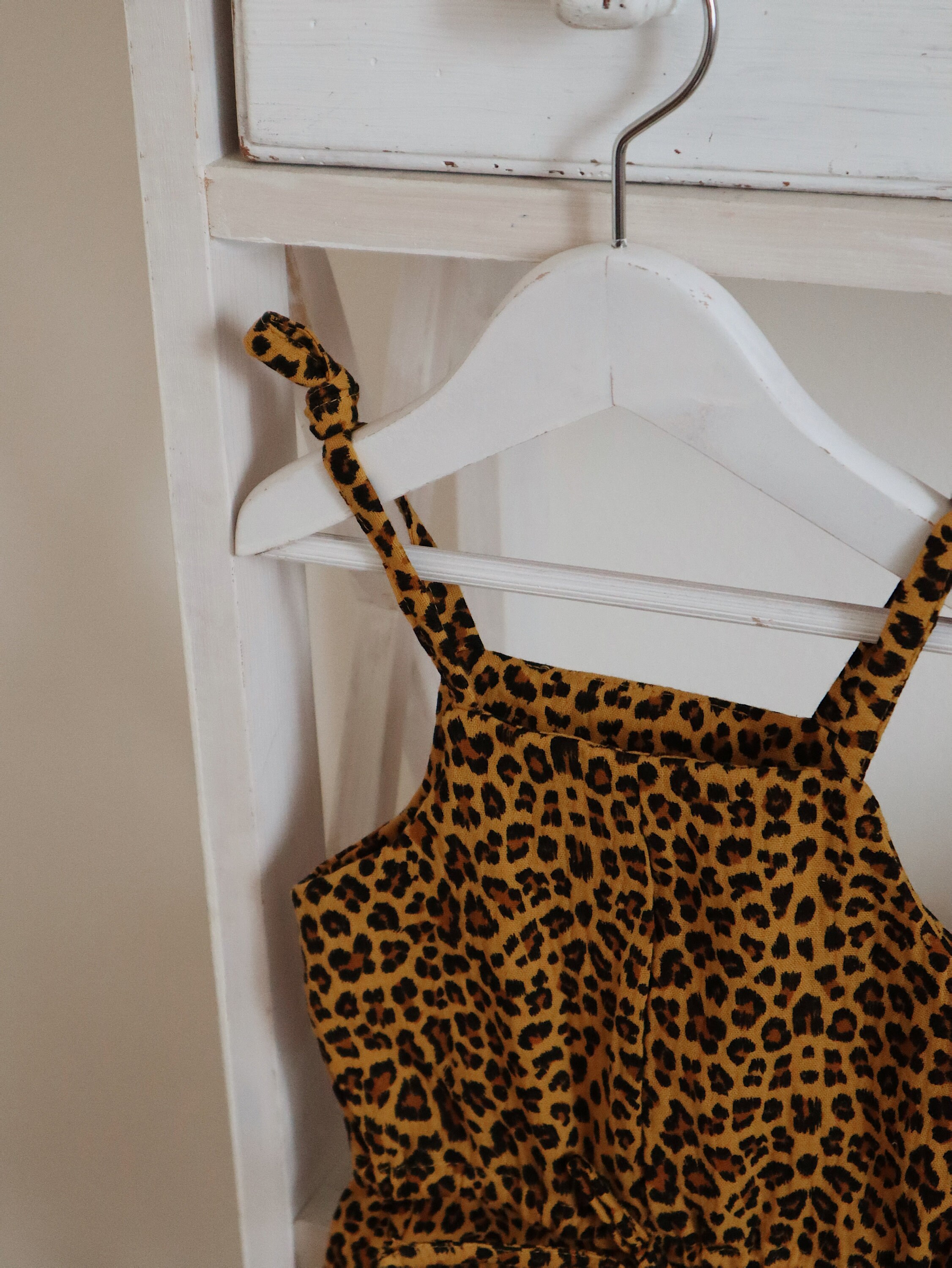 Cheetah Plunge neck romper main image 0