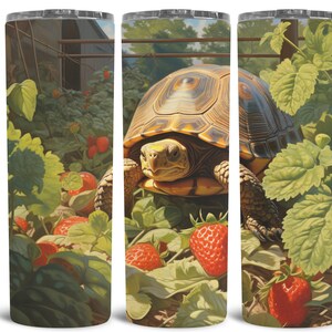 May include: A brown and yellow tortoise with a patterned shell is walking through a patch of green plants with red strawberries. The tortoise is in the center of the image and is facing the right side of the image. The background is a blurry image of a wooden fence and a green field.
