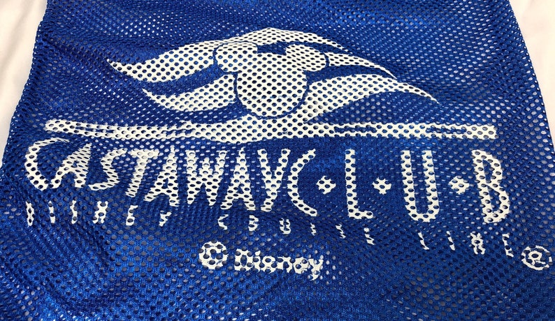 May include: Blue mesh bag with a white logo that says "Castaway Club" with a white Disney logo underneath.