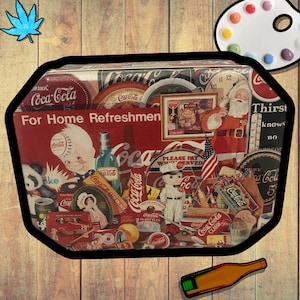 May include: A collage of vintage Coca-Cola advertising items, including signs, bottles, and Santa Claus imagery. The dominant colors are red and white, with various text elements and illustrations. The phrase "For Home Refreshment" is visible.