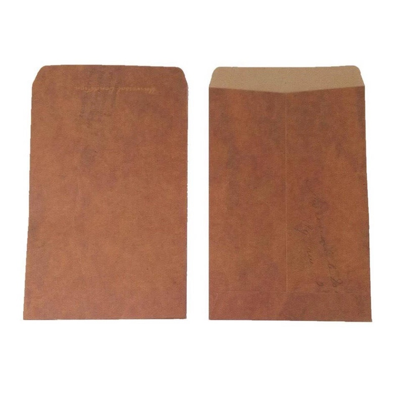 May include: Two brown paper envelopes, one with a slightly lighter shade of brown. Both envelopes are blank.