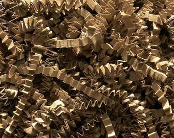 May include: Brown paper shred for packaging and gift wrapping. The shred is made of recycled paper and is biodegradable.