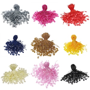 May include: Assortment of 100 pieces of string with plastic tags in various colors, including gray, pink, red, blue, brown, yellow, light pink, and black.