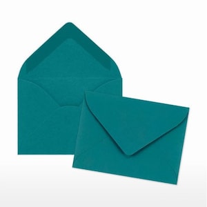 May include: Two teal blue envelopes, one slightly larger than the other, are shown on a white background. The envelopes are made of a textured paper.