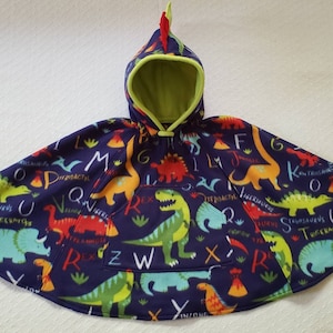 2-dniowa realizacja || Ponczo z fotelika samochodowego w kształcie dinozaura || T-Rex || Stegozaur || Ponczo z fotelika samochodowego || Ponczo dla malucha || Płaszcz z fotelika samochodowego || Płaszcz z fotelika samochodowego