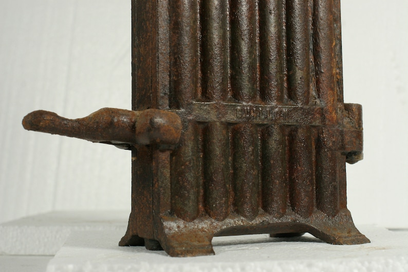 Taper candle mold antique French cast iron hinged 12 candle mold late 1800s to early 1900s used in churches /& monasteries