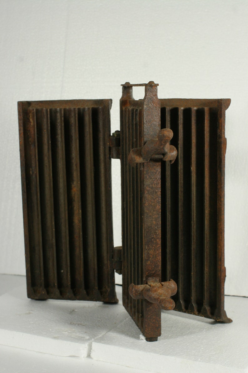 Taper candle mold antique French cast iron hinged 12 candle mold late 1800s to early 1900s used in churches /& monasteries