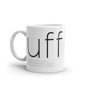 May include: White ceramic mug with a black graphic of the word "uff" and a definition of the word below. The definition reads: "an exclamation used to express bafflement, surprise, relief, exhaustion, or dismay."