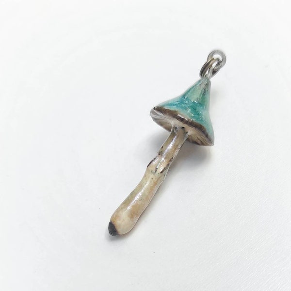 Turquoise Mushroom Pendant (hangs from a textile cord)