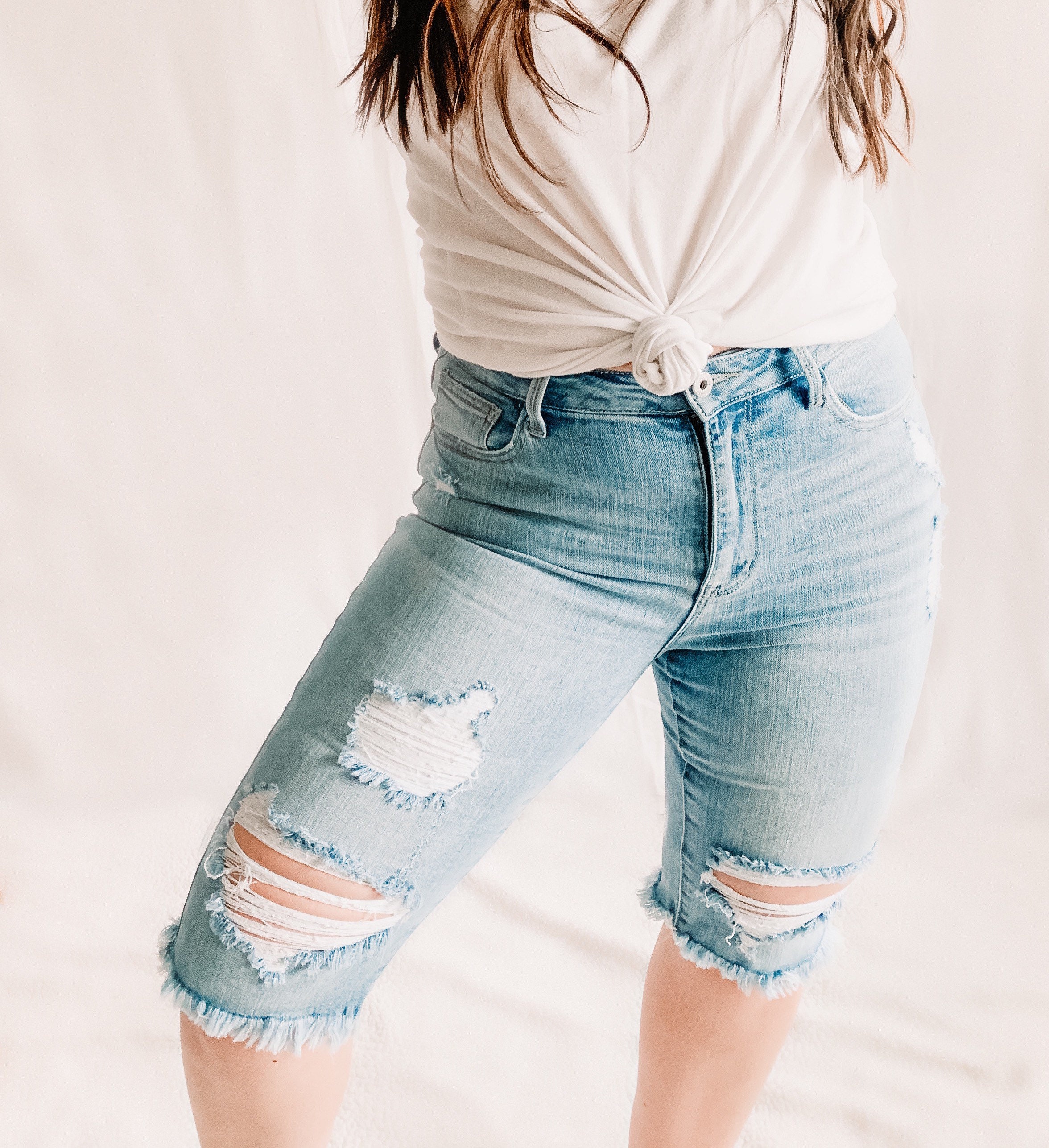 distressed women jeans