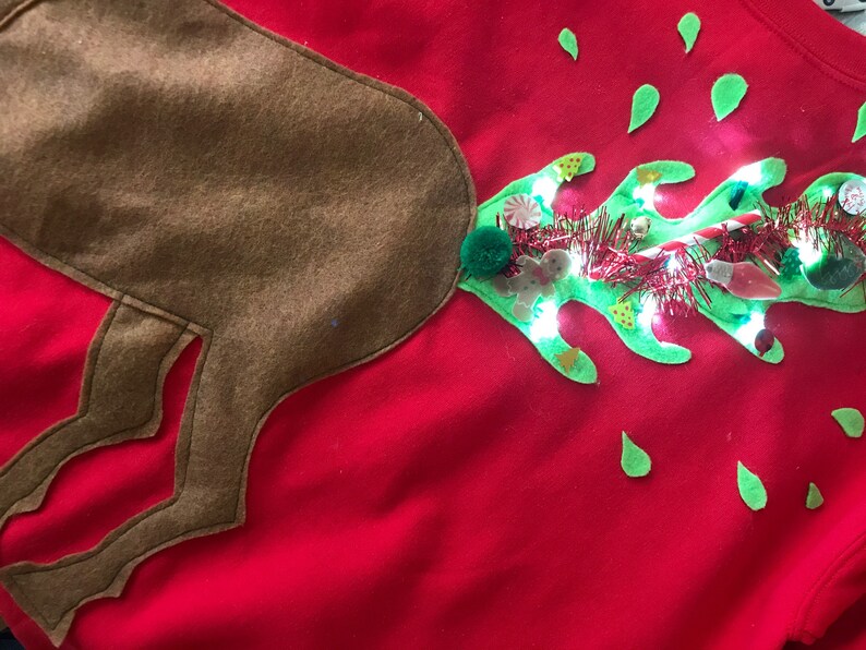 Ugly Christmas sweater barfing reindeer on front and pooping Etsy Ugly Christmas sweater barfing reindeer on front and pooping Etsy