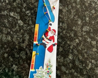 Christmas Tie, poor Santa falling off the icy roof and hanging onto the Christmas lights - Original design by Burst Creations