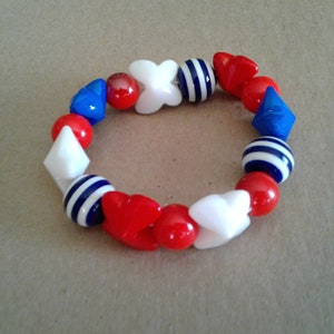 Red white and blue butterfly and striped beaded bracelet