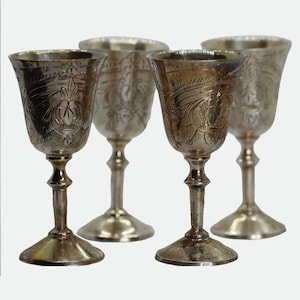 A set of four English EPNS shot glasses, late 19th century