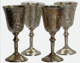 A set of four English EPNS shot glasses, late 19th century