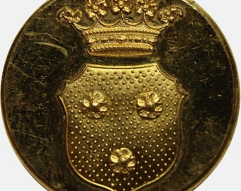 Antique gilded livery button with the family coat of arms of von Rosen