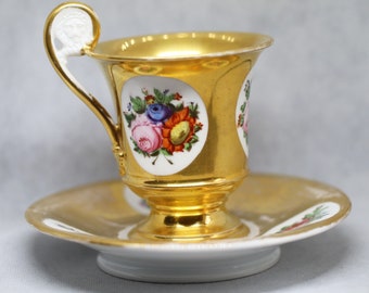 Antique France Paris Porcelain Bone China Cup and Saucer Gilded Flora Lion Handle XIXc