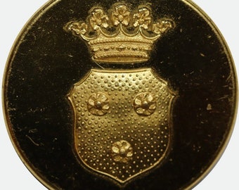 Antique gilded livery button with the family coat of arms of von Rosen