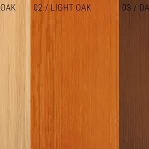 May include: Three wood samples showing different shades of oak: natural, light, and dark. The samples are arranged vertically, with the natural oak on the left, the light oak in the middle, and the dark oak on the right.