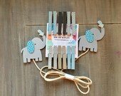 Baby onesie display, onesie display,baby boy clothes display for a baby shower, baby shower decoration, boy decoration