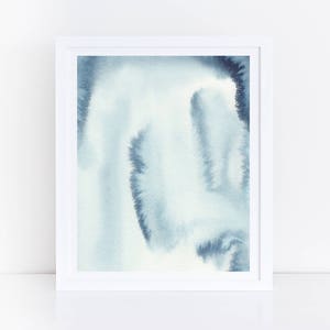 May include: Abstract watercolour painting in shades of blue and white. The painting features a swirling, organic shape with a soft, ethereal quality.
