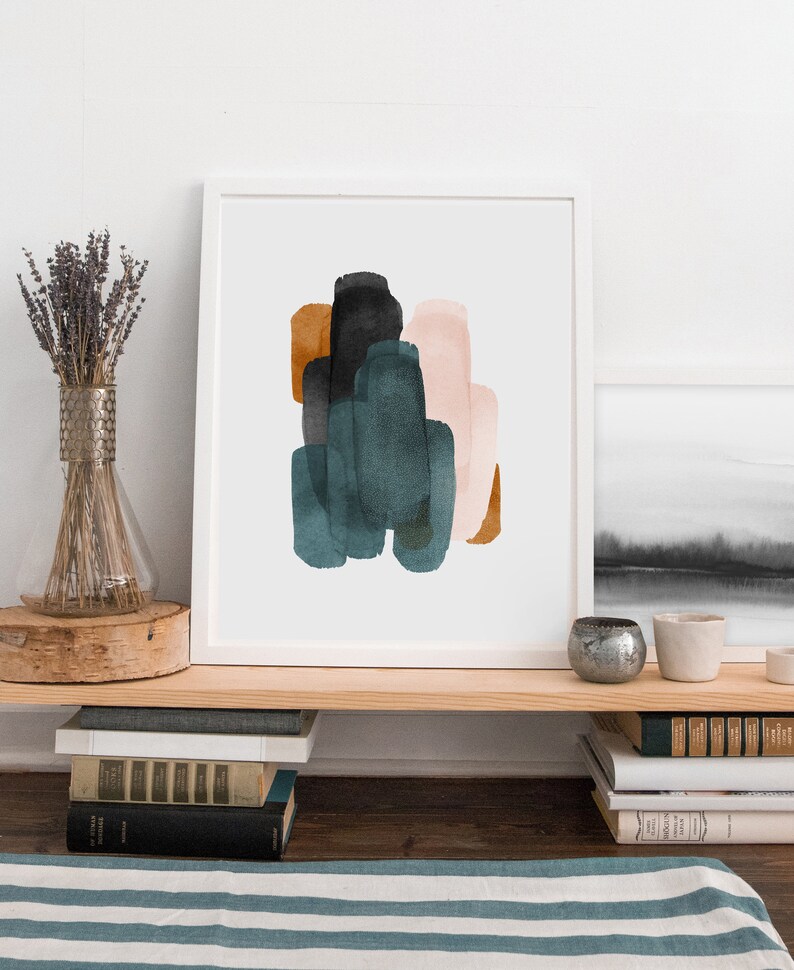 May include: Abstract art print with a white background and a cluster of overlapping shapes in shades of teal, brown, black, and pink.