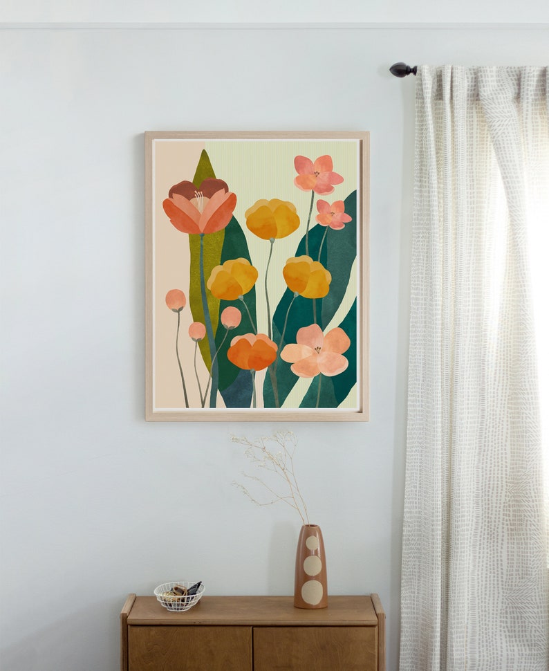 modern floral wall art with painted colorful flowers hanging on a wall